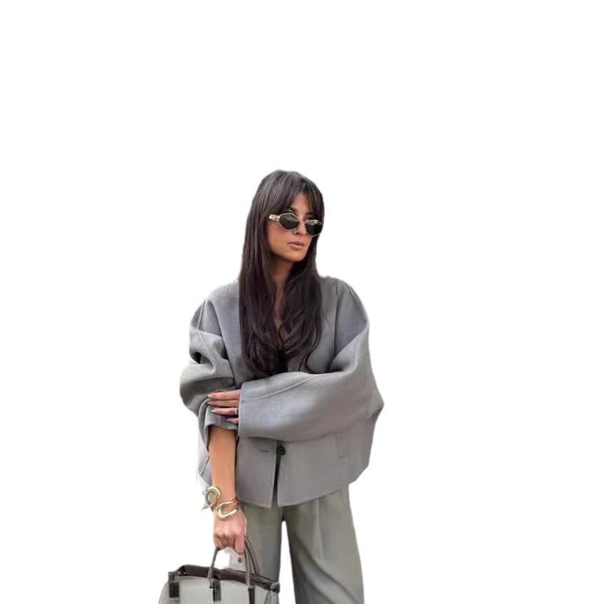 Damen kurze Strickjacke mit eleganten Knöpfen und weitem Schnitt Heidi-Mode