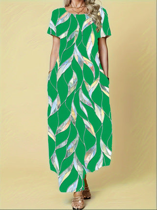 Damen Maxikleid mit elegantem Blattmuster und praktischen Taschen Heidi-Mode