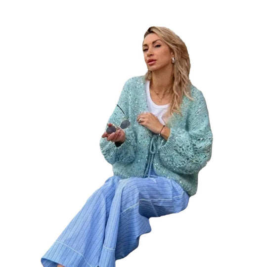 Damen Grobstrickjacke mit festlichem Knotendetail und weit geschnittenen Ärmeln Heidi-Mode