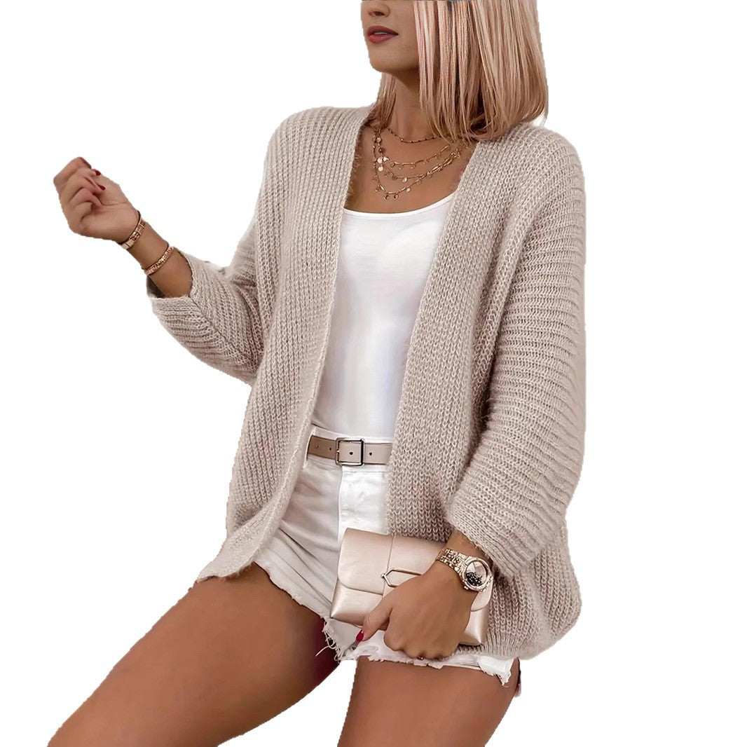 Damen leichte Strickjacke mit oversized Silhouette und tiefem V-Ausschnitt Heidi-Mode