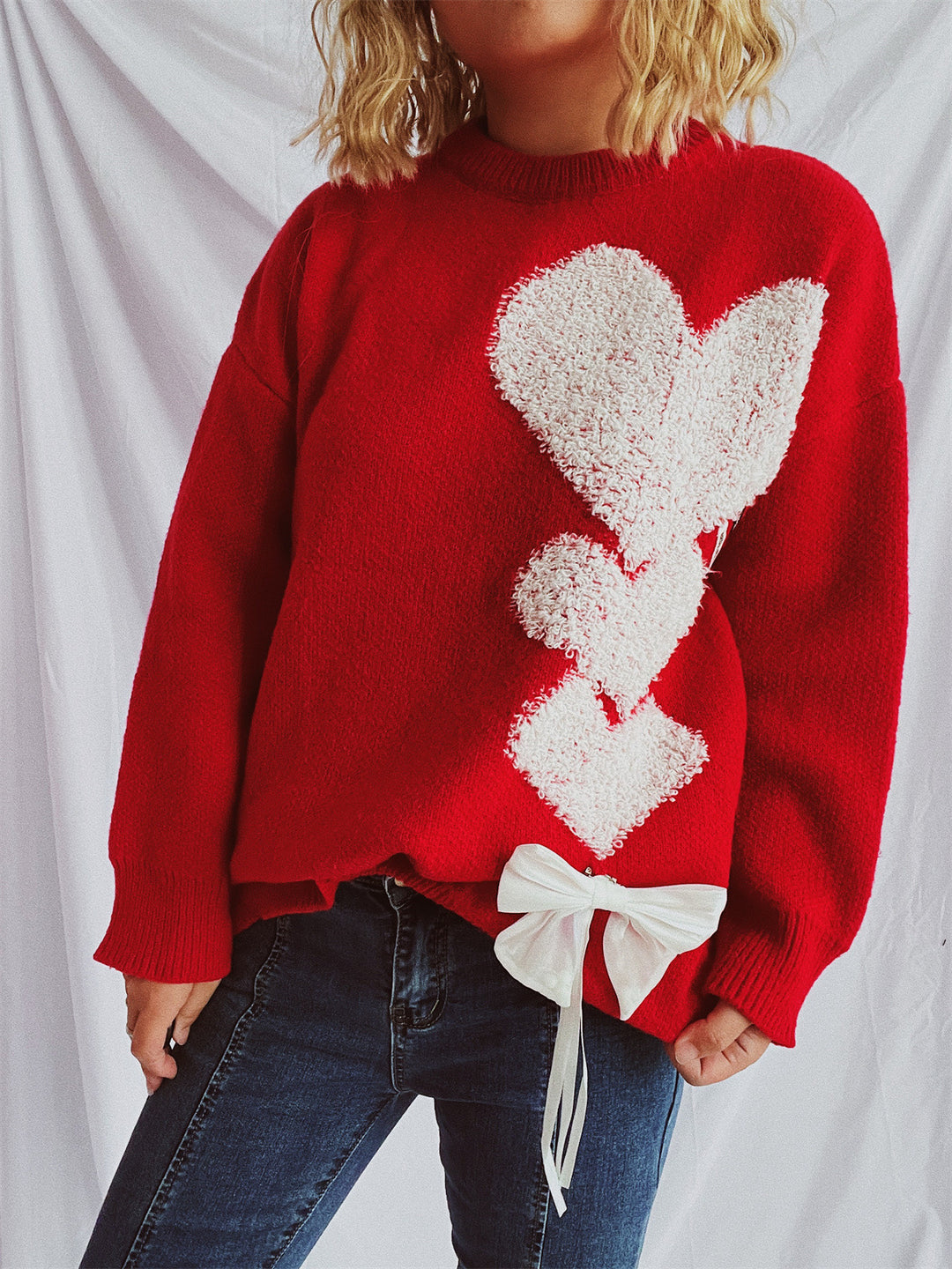 Damen Pullover mit herzförmigem Design und dekorativer Schleife Heidi-Mode