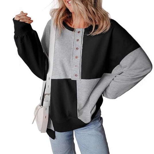 Damen lässiger Kapuzenpullover mit Knopfdetails und Farbblockdesign Heidi-Mode