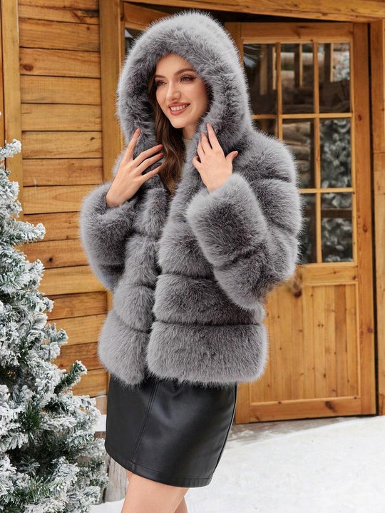 Damen Trendige Kunstpelzjacke mit Kapuze Heidi-Mode