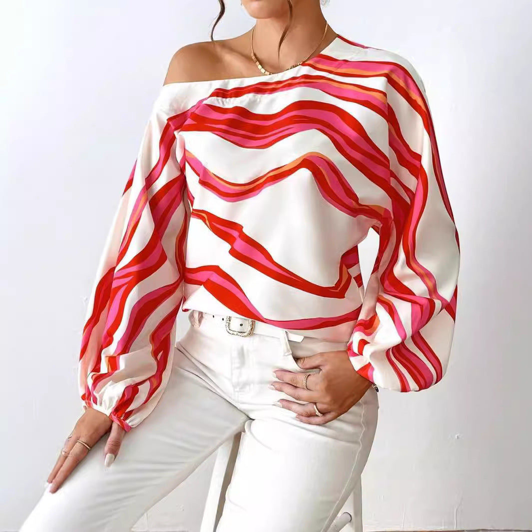 Damen Off-Shoulder Bluse mit voluminösen Ärmeln und maritimem Wellenmuster Heidi-Mode