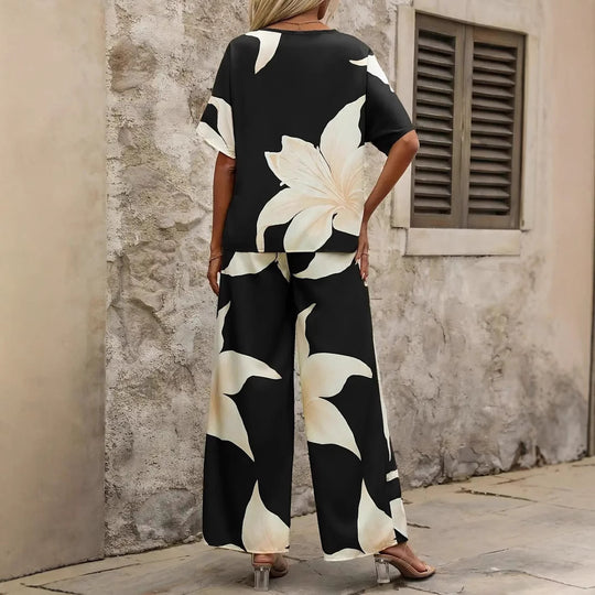 Damen Eleganter Jumpsuit mit floralen Mustern und weitem Bein Heidi-Mode
