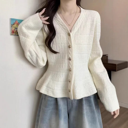 Damen elegante Strickjacke mit strukturiertem Design und femininen Puffärmeln Heidi-Mode