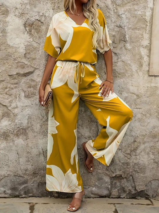 Damen Eleganter Jumpsuit mit floralen Mustern und weitem Bein Heidi-Mode