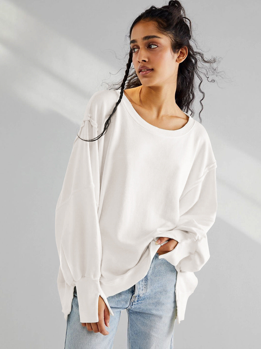 Damen Oversized Sweatshirt mit kreativem Saumdesign Heidi-Mode