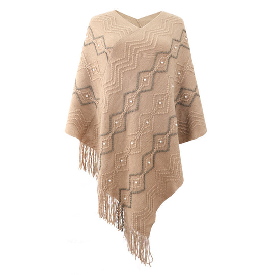 Damen eleganter Poncho mit auffälligem Strukturmuster und dekorativen Fransen Heidi-Mode