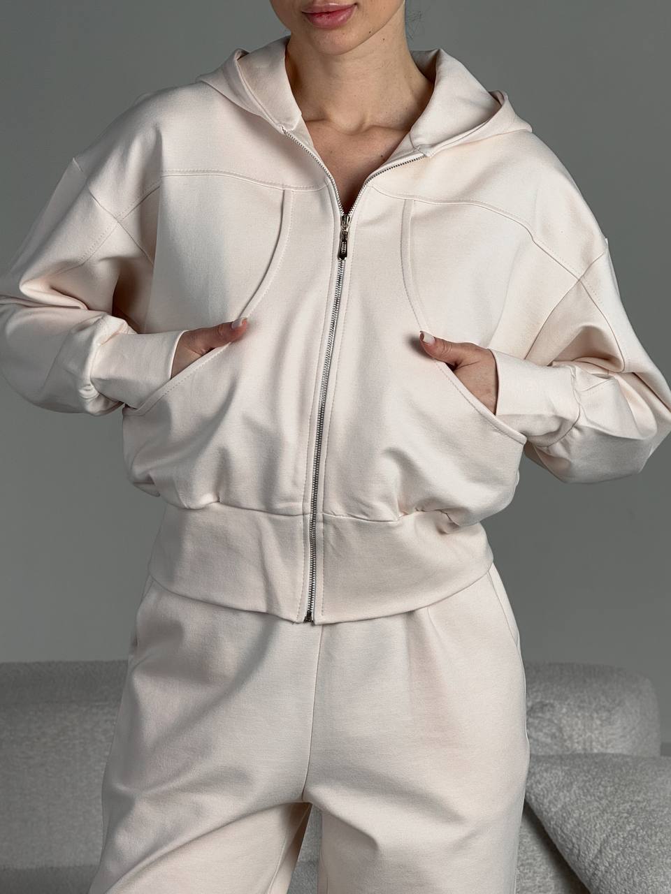 Damen angeschnittene Kapuzenjacke mit Reißverschluss und Taschen Heidi-Mode