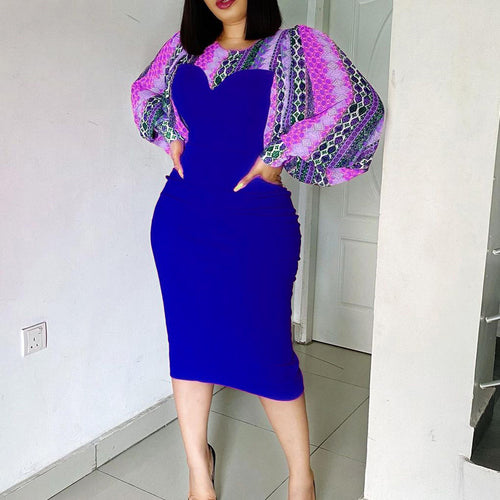 Damen Midi-Kleid mit extravaganten puffärmel und kontrastierendem Oberteil Heidi-Mode