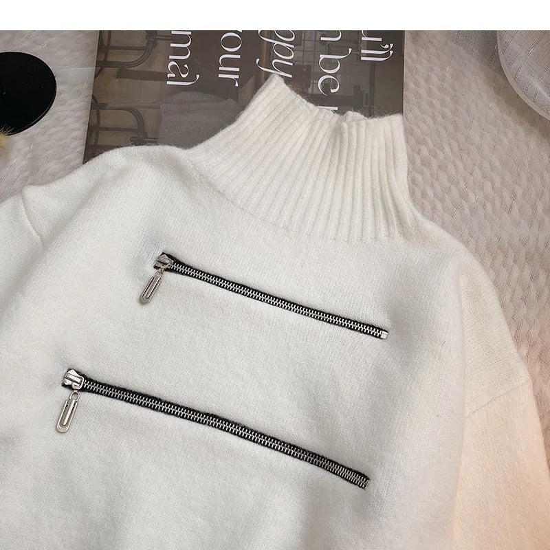 Damen stylischer Stehkragenpullover mit zwei asymmetrischen Reißverschlusstaschen und fransigem Saum Heidi-Mode
