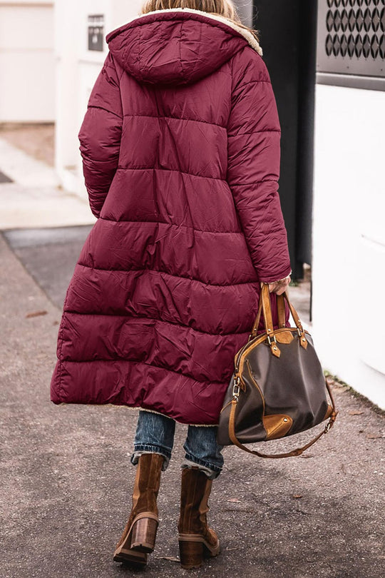 Damen lange, gefütterte Winterjacke mit Kapuze und stylischem Schnitt Heidi-Mode