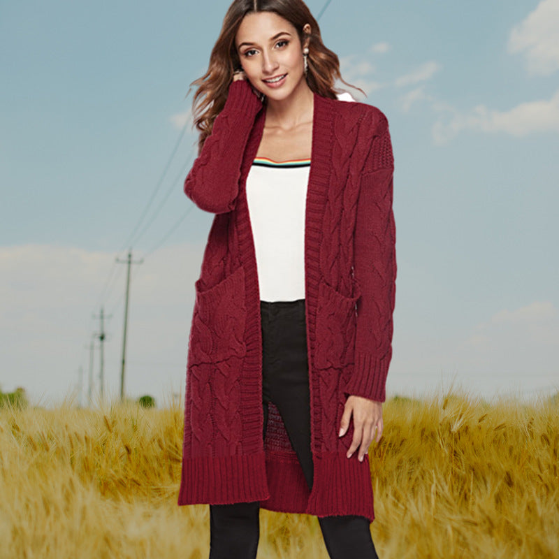 Damen Strickmantel mit großen Taschen und eleganten Zopfmustern Heidi-Mode