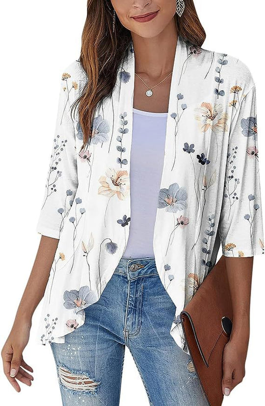 Heidi Mode | Einfarbige Strickjacke mit sieben Viertelärmeln und Rüschenrand