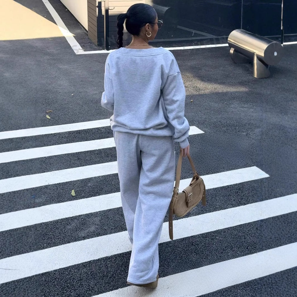 Damen lässiges V-Ausschnitt Sweatshirt und weite Jogginghose Heidi-Mode