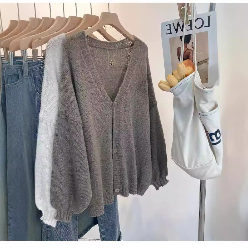 Damen Flauschiger Strickcardigan mit voluminösen Ärmeln und Knopfdetails Heidi-Mode