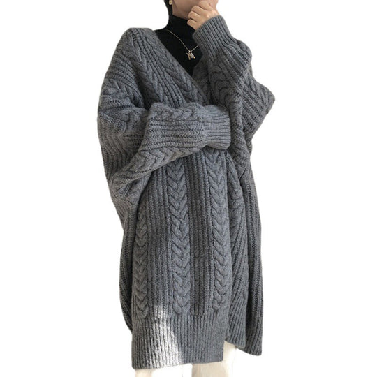 Damen Strickponcho mit tiefem V-Ausschnitt und trendigem Zopfmuster Heidi-Mode