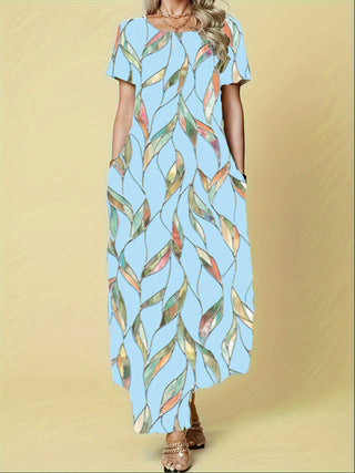 Damen Maxikleid mit elegantem Blattmuster und praktischen Taschen Heidi-Mode