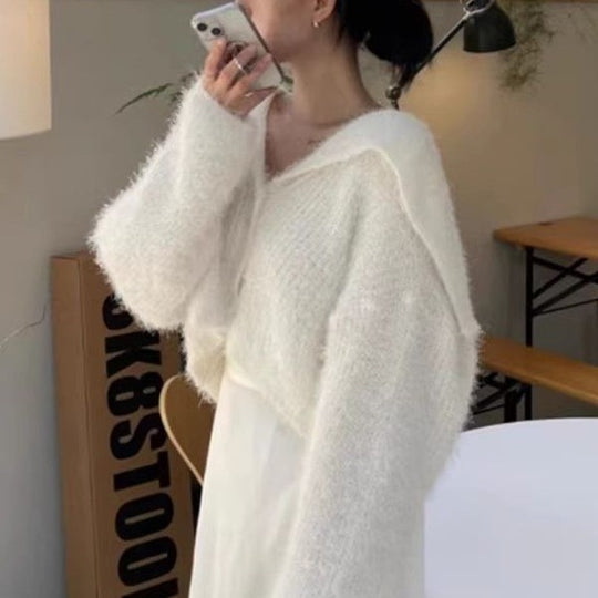 Damen lässiger Pullover mit tiefem V-Ausschnitt und strukturiertem Maschenmuster Heidi-Mode