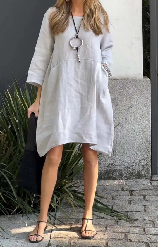 Damen lässiges Leinenkleid mit praktischen Taschen und asymmetrischem Saum Heidi-Mode