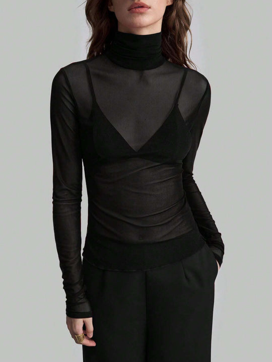 Damen Transparente Turtleneck-Bluse mit figurformendem Schnitt Heidi-Mode