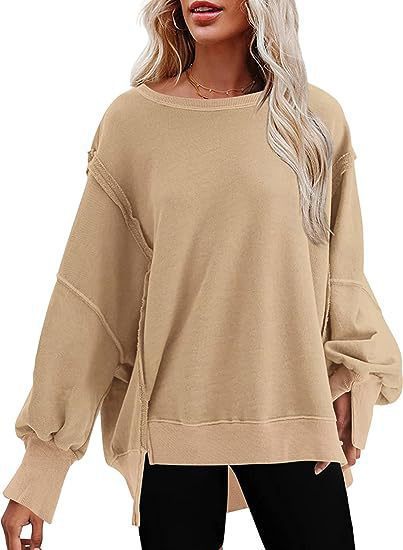Damen Oversize Sweatshirt mit Ballonärmeln und seitlichen Schlitzen Heidi-Mode