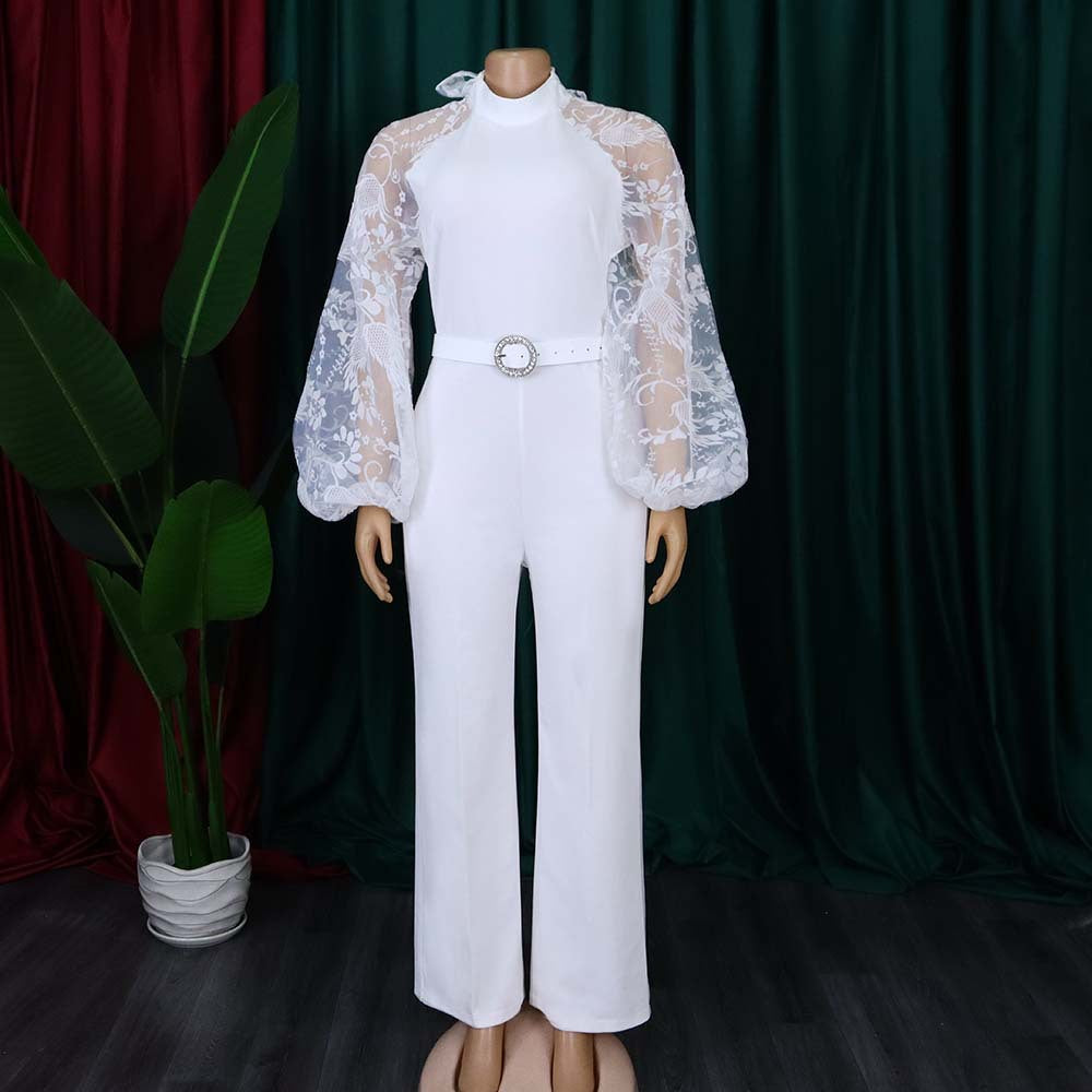 Damen Jumpsuit mit transparenten Puffärmeln und taillierbarem Gürtel Heidi-Mode