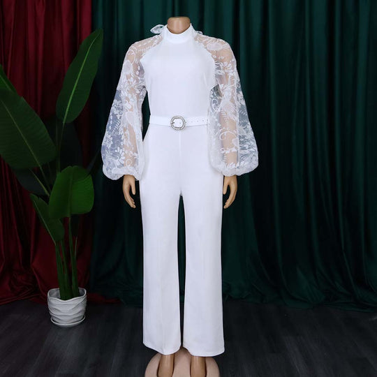 Damen Jumpsuit mit transparenten Puffärmeln und taillierbarem Gürtel Heidi-Mode