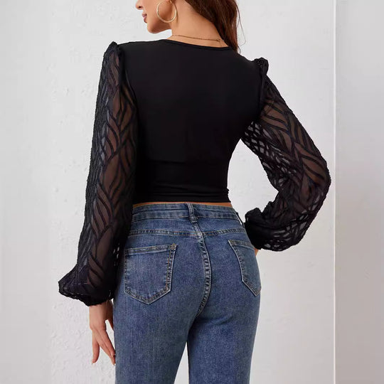 Damen Figurbetontes Oberteil mit transparenten Puffärmeln Heidi-Mode