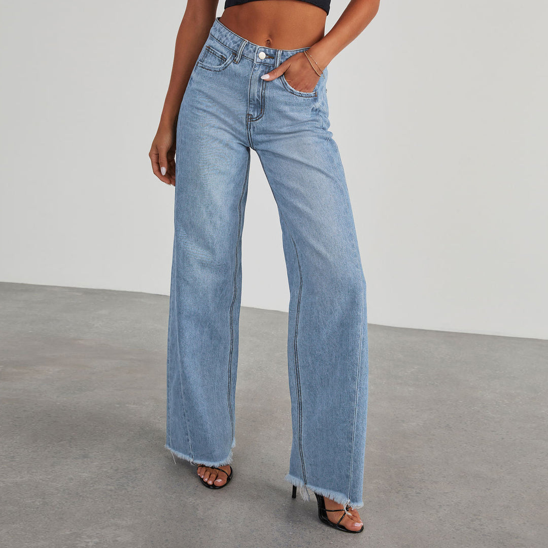 Damen Weitgeschnittene Jeans mit fransigen Säumen Heidi-Mode