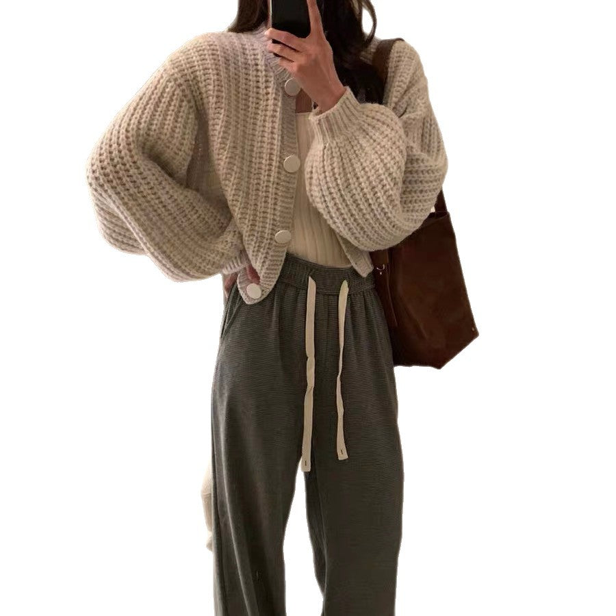 Damen Grobstrickcardigan mit voluminösen Ärmeln und großen Knöpfen Heidi-Mode