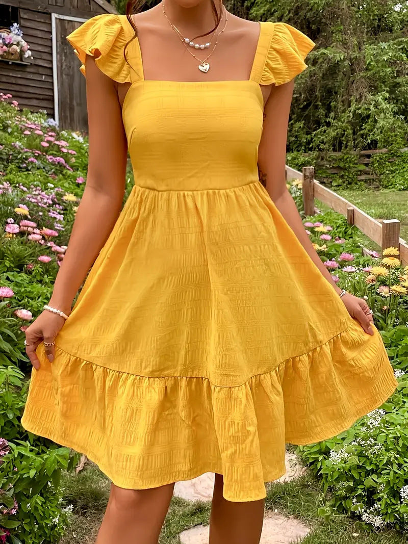 Damen luftiges Baumwollkleid mit Rüschendetails und offenen Rücken Heidi-Mode