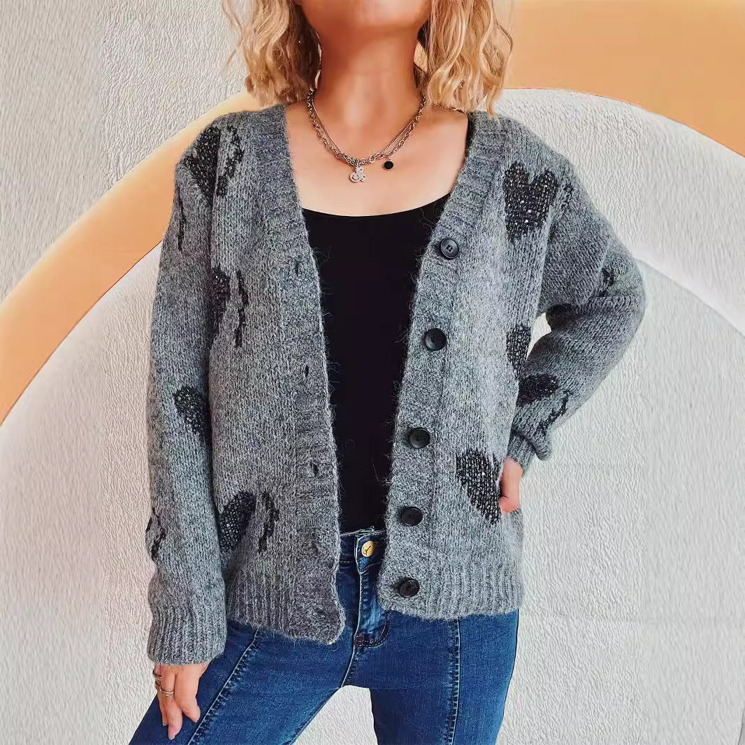 Damen gestrickte Cardigan mit Herzmuster und Knopfdetails Heidi-Mode