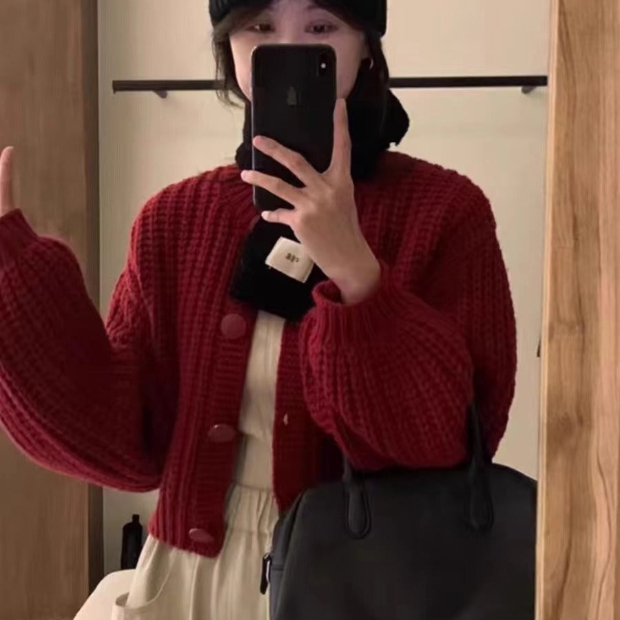 Damen Grobstrickcardigan mit voluminösen Ärmeln und großen Knöpfen Heidi-Mode
