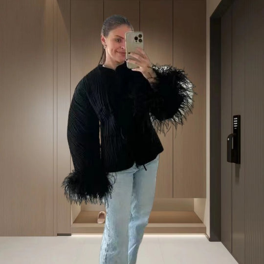 Damen Elegante Strickjacke mit voluminösen Ärmeln und feinem Muster Heidi-Mode