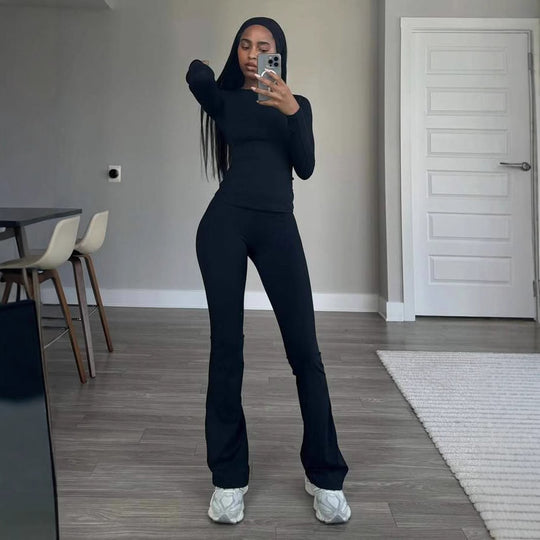 Damen Eleganter körperbetonter Jumpsuit mit langen Ärmeln und ausgestelltem Bein Heidi-Mode