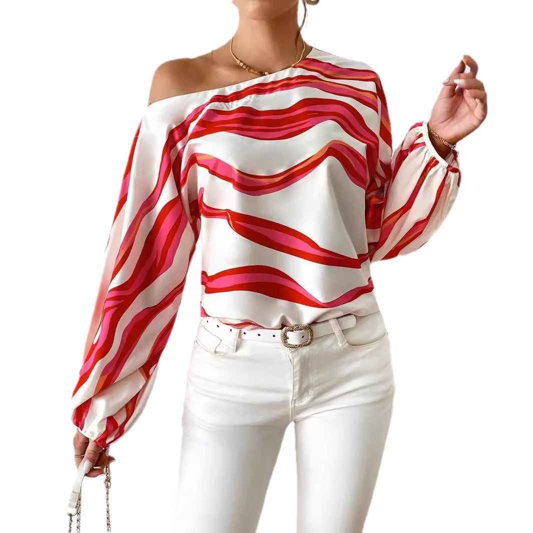 Damen Off-Shoulder Bluse mit voluminösen Ärmeln und maritimem Wellenmuster Heidi-Mode
