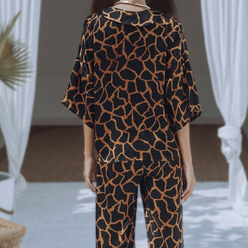 Damen Jumpsuit mit weit geschnittenen Beinen und elegantem Giraffenmuster Heidi-Mode