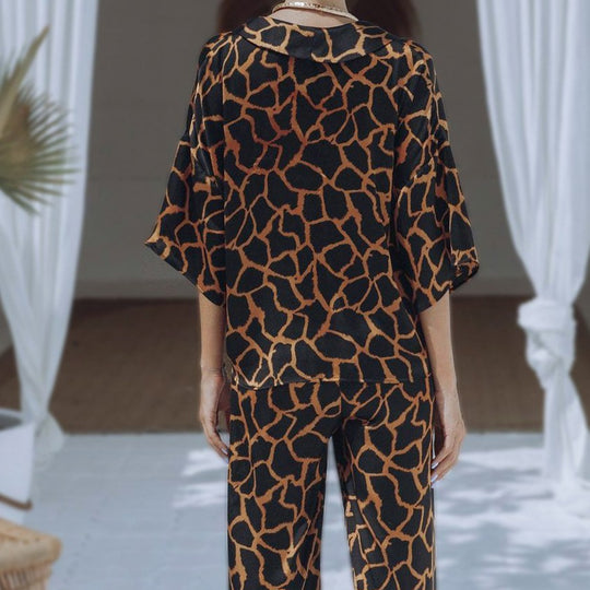 Damen Jumpsuit mit weit geschnittenen Beinen und elegantem Giraffenmuster Heidi-Mode