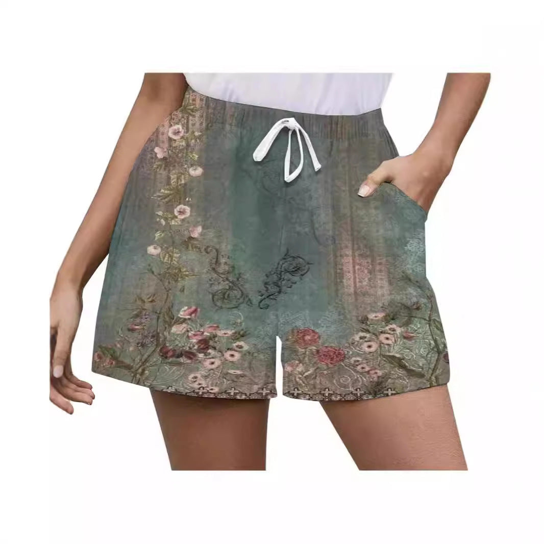 Damen Shorts mit floralem Muster und seitlichen Taschen Heidi-Mode