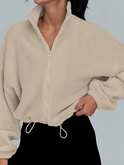 Damen Oversized Sweatjacke mit halbem Reißverschluss und Kordelzug Heidi-Mode