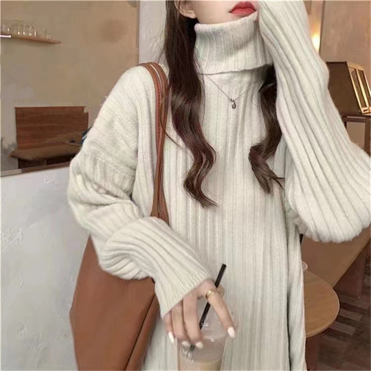 Damen Hochgeschlossenes Strickoberteil mit asymmetrischem Schnitt und feiner Rippstruktur Heidi-Mode