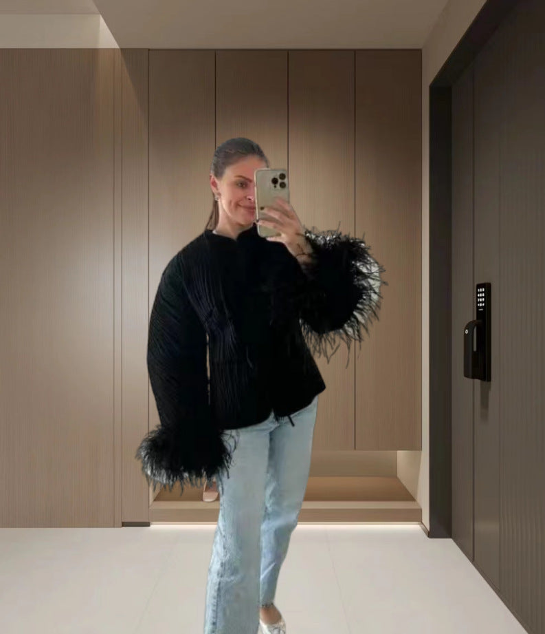 Damen Elegante Strickjacke mit voluminösen Ärmeln und feinem Muster Heidi-Mode