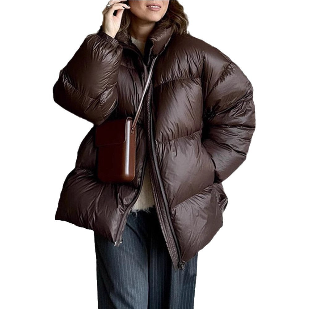 Damen Steppjacke im oversized Schnitt mit hohem Kragen und Taschen Heidi-Mode