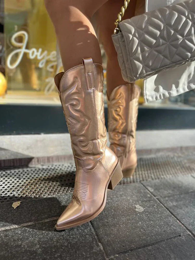 Elegante metallische Cowboy-Stiefel