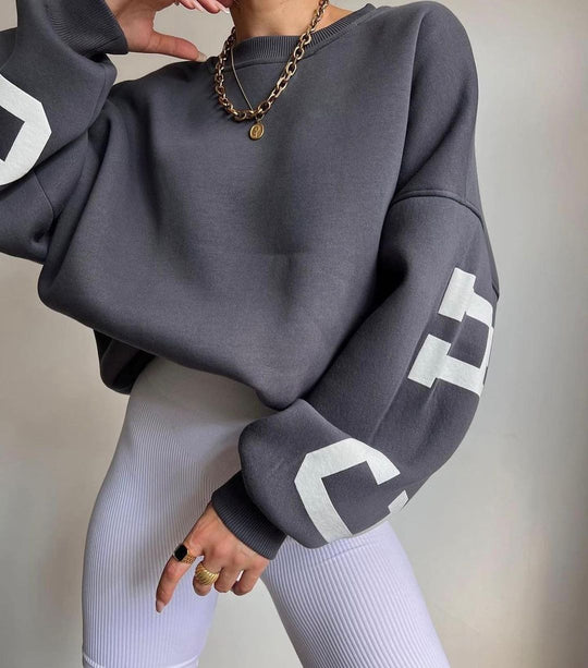 Heidi-Mode - Schickes Herbst Oversized Sweatshirt mit Chicago Buchstaben Grafik für Frauen