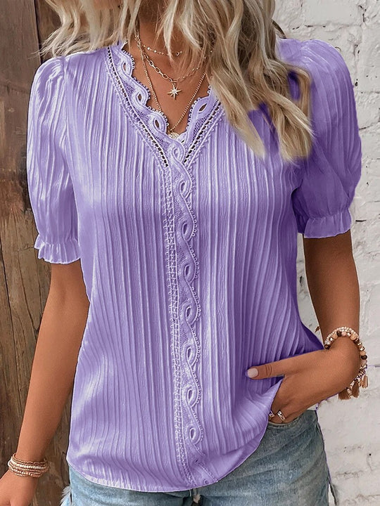 Bluse aus Spitze mit Puffärmeln