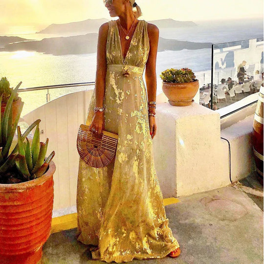 Fließendes Kleid mit V-Ausschnitt und Paillettenverzierung
