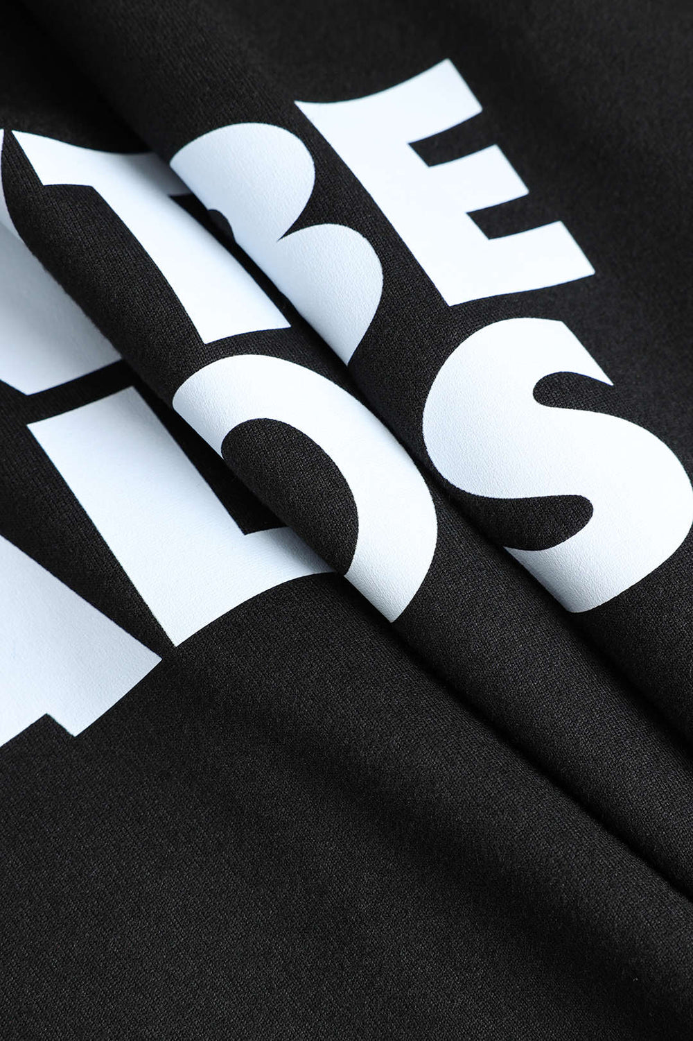 Heidi-Mode | Schwarz Kurzarm Cropped T-Shirt mit "Don'T Be Jealous" Druck